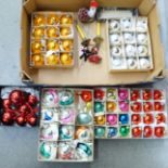 A large collection of vintage glass Christmas decorations, a box of garland glass decorations and