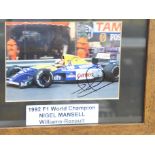 Formula 1; a framed and signed photograph, Nigel Mansell, frame 24 x 29cm