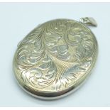 A large hallmarked silver locket, 40mm x 52mm