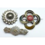 Two Victorian silver brooches and a Scottish brooch lacking one agate insert