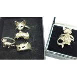 Five silver cat rings