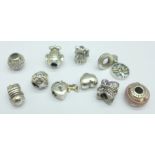 Ten silver Pandora charms