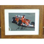 Formula 1; a framed and signed photograph, Michael Schumacher, frame 21.5 x 27cm