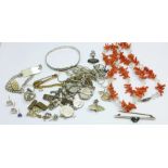 A collection of jewellery including silver