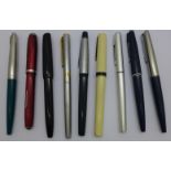 Nine assorted fountain pens including three Parker and one red Esterbrook