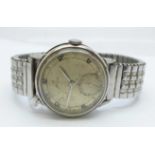 A Omega wristwatch with subsidiary second hand dial, inscription to case back 'Len From Louie 28.2.