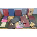 A box of empty albums of stamps and a box of folders and notebooks **PLEASE NOTE THIS LOT IS NOT