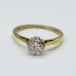 An 18ct gold and platinum set diamond solitaire ring, approximately 0.85 carat diamond weight,
