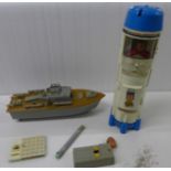 A Six Million Dollar Man figure and capsule, and a remote control boat, a/f