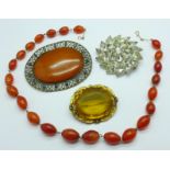 Three vintage brooches and an agate necklace, 'diamante' brooch marked Weiss