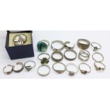 Eighteen silver and white metal rings, mainly small sizes, shamrock ring a/f