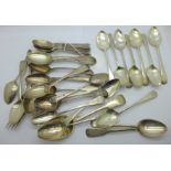 Thirty-two silver teaspoons including 19th Century, 602g, (with one plated fork)