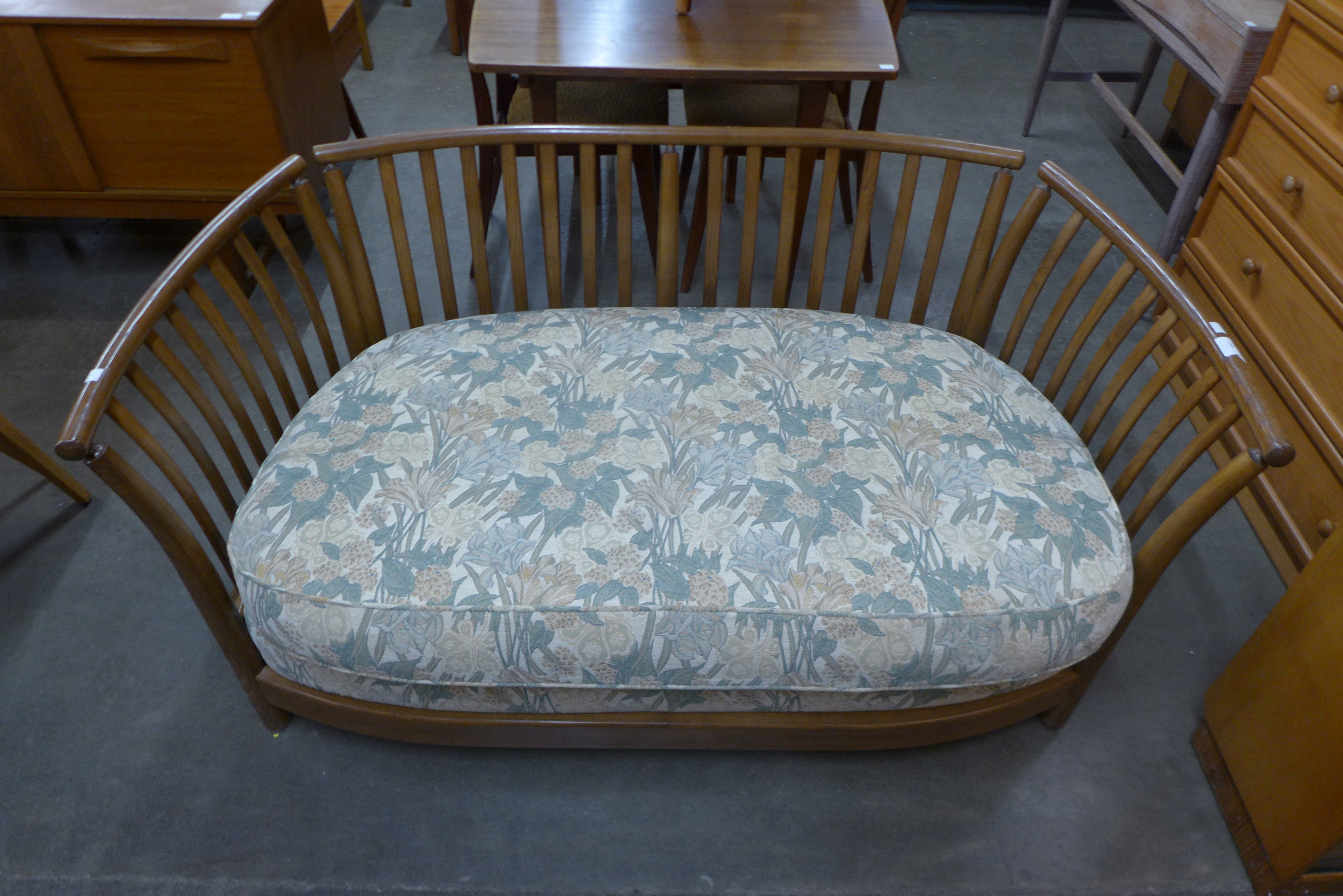 An Ercol Golden Dawn elm settee