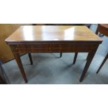 A Regency inlaid mahogany rectangular fold over tea table