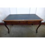 An early 20th Century French mahogany two drawer bureau plat