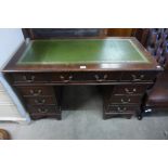 A mahogany pedestal desk