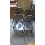 A set of four elm and beech wheelback chairs