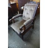 A Victorian mahogany and upholstered reclining armchair