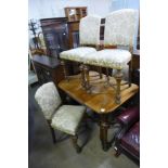 A Queen Anne style burr walnut extending dining table and four chairs