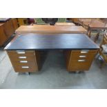 A teak and chrome desk