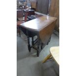 An oak gateleg table