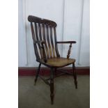 A Victorian elm and beech farmhouse armchair