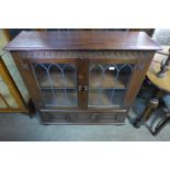 An oak two door bookcase