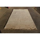 An Indo Gabbeh beige woollen rug 240 x 170cms