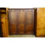 A Victorian stained pine and beech six door locker cabinet, 137cms h, 132cms w, 40cms d