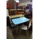 A 1960's kitchen table, sideboard, two stools and a chair