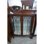 A mahogany display cabinet