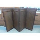 An Arts and Crafts mahogany four panel folding dressing screen, 155cms h