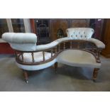 A Victorian style mahogany and upholstered coversation seat, 73cms h, 131cms w, 100cms d