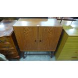 A teak record cabinet