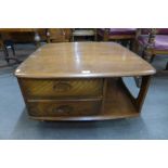 An Ercol Golden Dawn Pandora's box coffee table