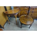 A mahogany circular coffee table and a demi-lune hall table