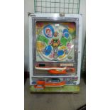 A Japanese Mizuho wall mounted pinball game