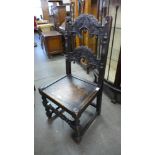 A Carolean style carved oak side chair