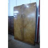 A 1930's burr walnut wardrobe, 187cms h, 119cms w, 54cms d