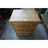 A small pine chest of drawers