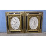 A pair of faux marble relief plaques, manner of J.P Darbien, framed