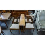 A teak drop-leaf table and four chairs