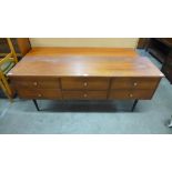 A small teak sideboard