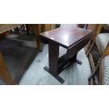 An oak drop-leaf occasional table