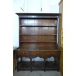 A Victorian stained pine dresser, 207cms h, 152cms w, 47cms d