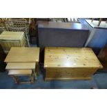 A pine blanket box and an oak nest of tables