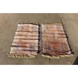 A pair of small eastern terracotta ground prayer rugs, 100 x 68cms