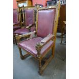 A Victorian Gothic Revival oak and upholstered armchair, 117cms h, 64cms w, 60cms d