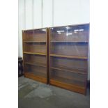 A pair of teak bookcases