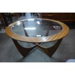 A G-Plan Astro teak and glass topped circular coffee table